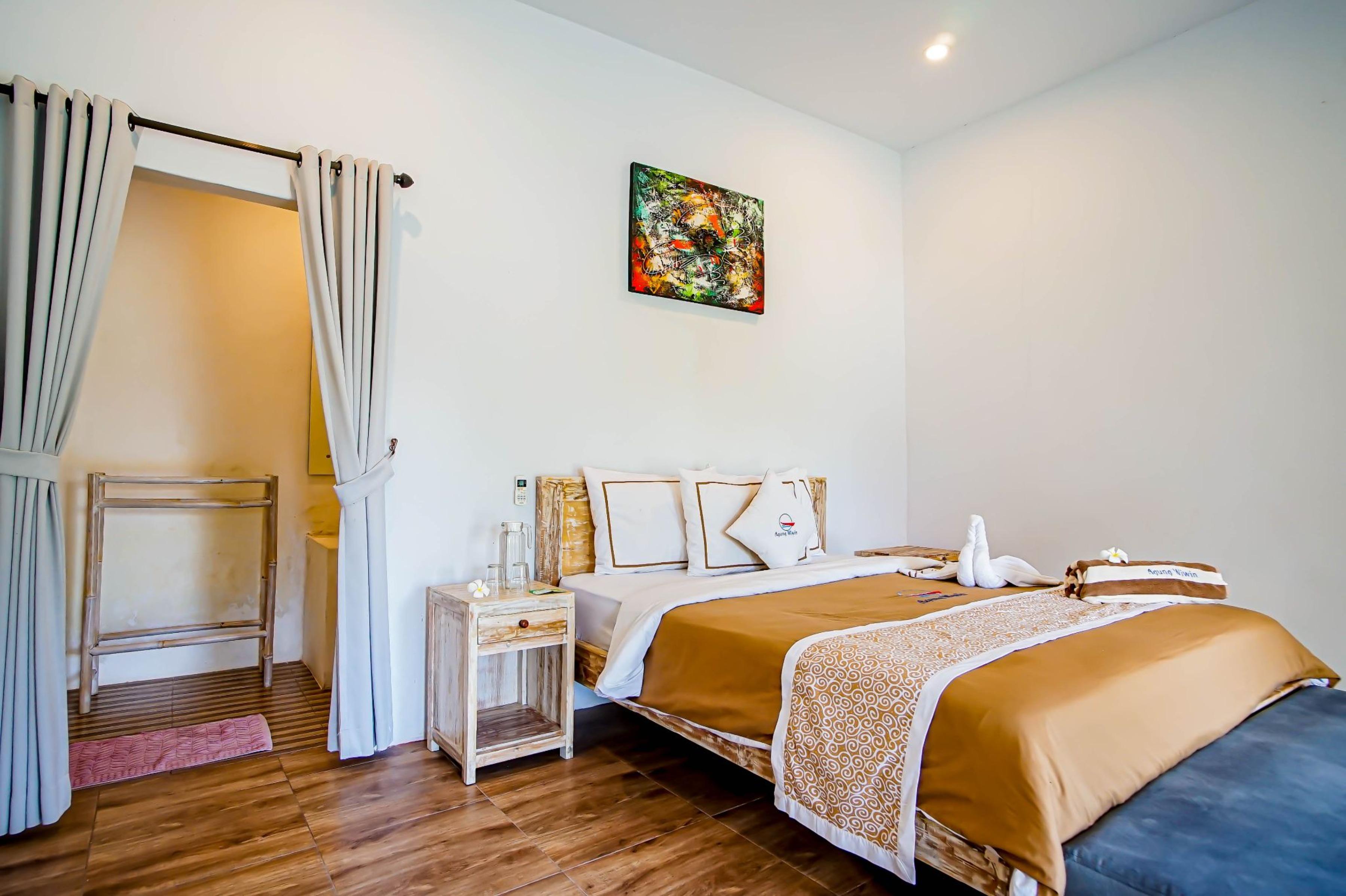 Agung Wiwin Homestay & Restaurant Mengwi Esterno foto