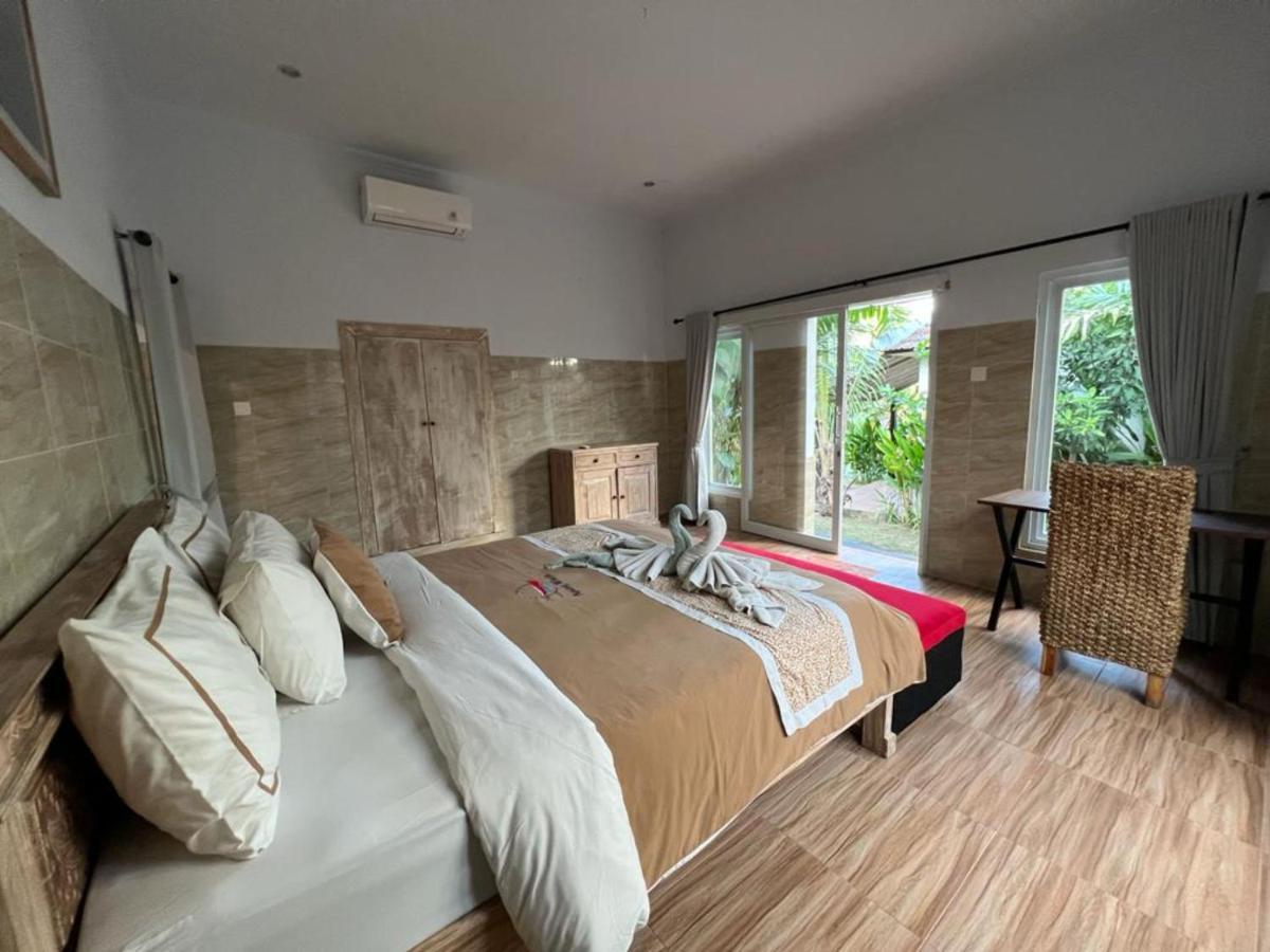Agung Wiwin Homestay & Restaurant Mengwi Esterno foto