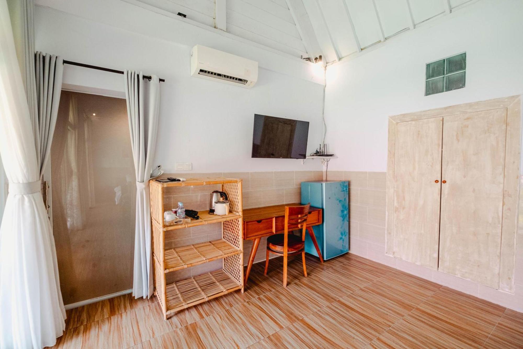 Agung Wiwin Homestay & Restaurant Mengwi Esterno foto