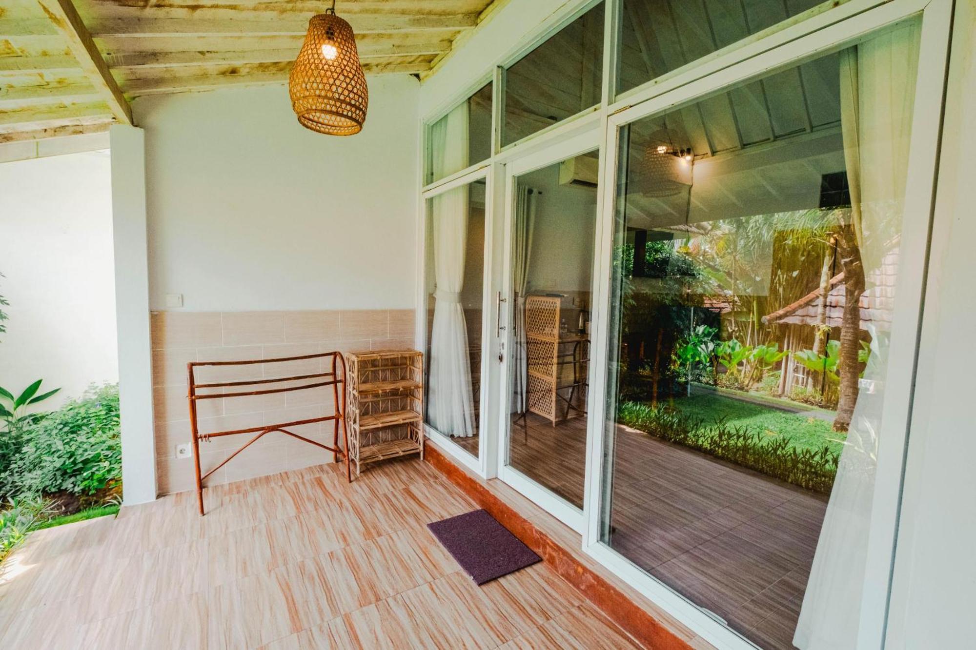 Agung Wiwin Homestay & Restaurant Mengwi Esterno foto