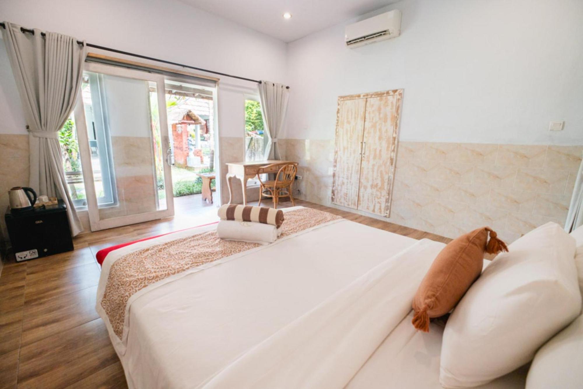 Agung Wiwin Homestay & Restaurant Mengwi Esterno foto